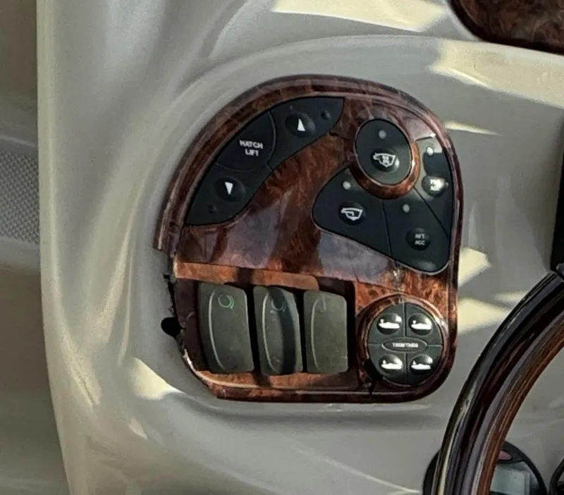 Slide: The Image of Control panel of 2006 Sea Ray 280 Sundancer boat with wood finish. - 20