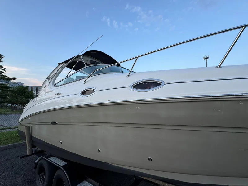 Slide: The Image of 2006 Sea Ray 280 Sundancer boat on trailer, side view. - 3