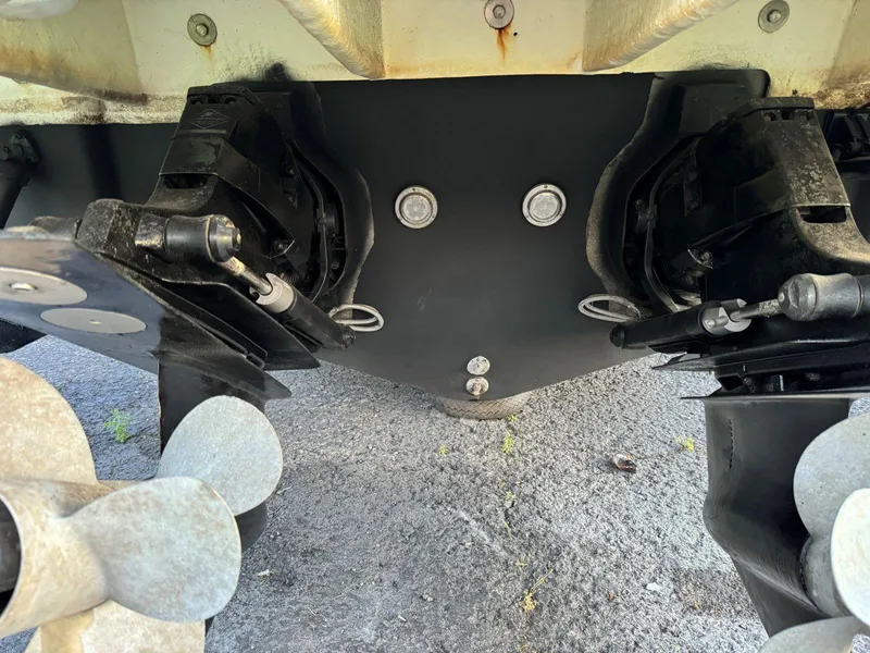 Slide: The Image of 2006 Sea Ray 280 Sundancer boat propellers and stern drive close-up. - 40