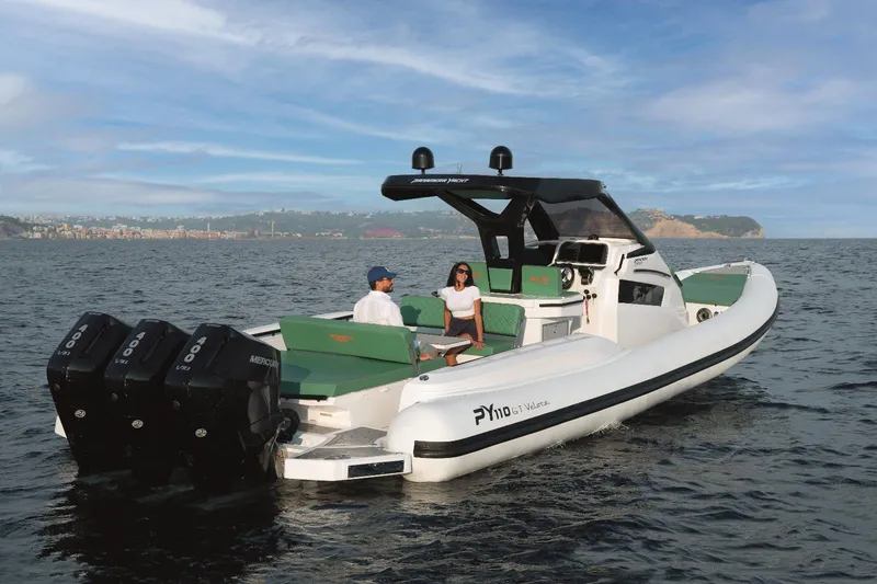 Slide: The Image of Panamera Yacht PY 110 Veloce 2025 cruising on open water, scenic coastal backdrop. - 13