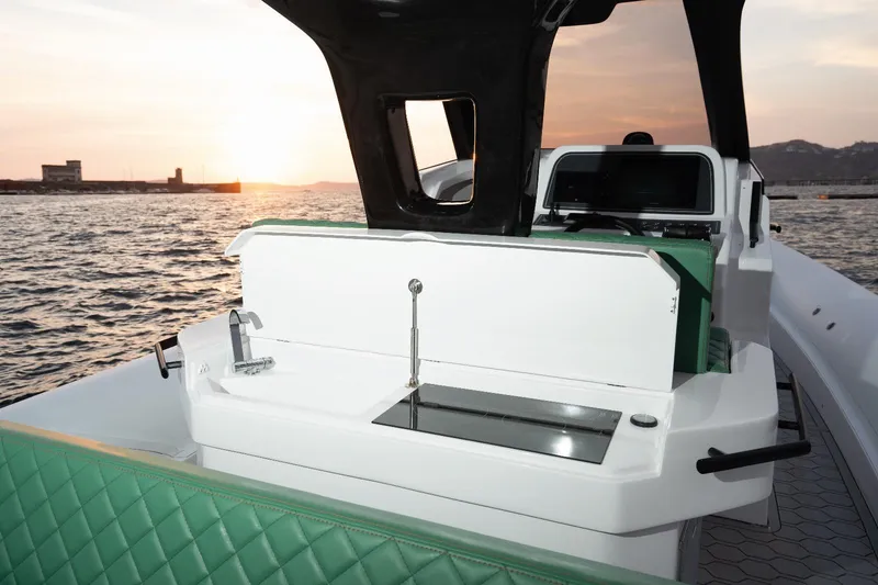 Slide: The Image of 2025 Panamera Yacht PY 110 Veloce with open onboard refrigerator, sleek deck design. - 10