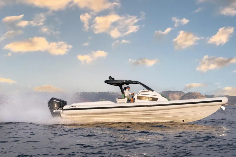 Slide: The Image of 2025 Panamera Yacht PY 110 Veloce cruising on open water under a vibrant sky. - 4
