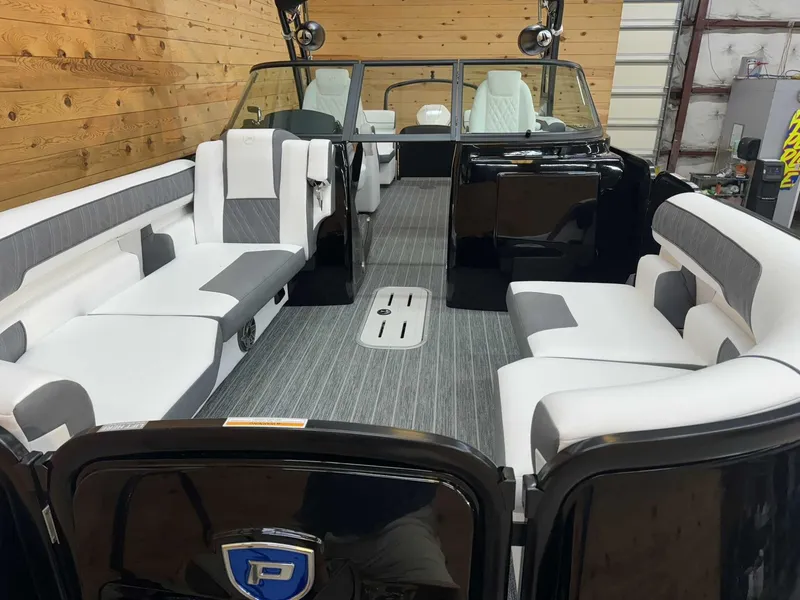 Slide: The Image of 2024 Premier 250 Super Sport boat interior with modern seating and sleek design. - 6