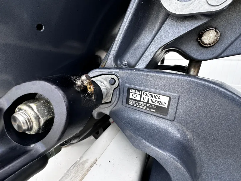 Slide: The Image of Close-up of Yamaha F300UCA engine part on 2019 Robalo R247 Dual Console boat. - 33
