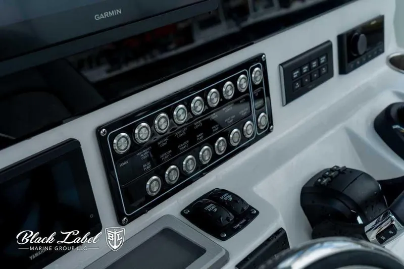 Slide: The Image of Control panel of 2025 Sea Fox 288 Commander Center Console boat with Garmin display. - 19