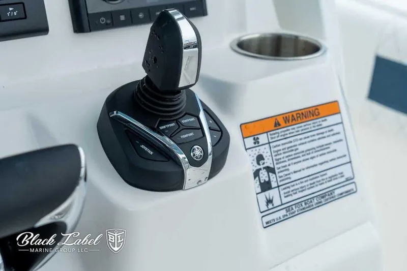 Slide: The Image of Joystick control on 2025 Sea Fox 288 Commander Center Console boat dashboard. - 21