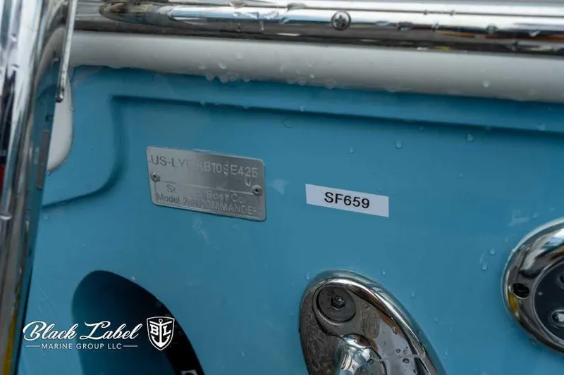 Slide: The Image of 2025 Sea Fox 288 Commander Center Console boat with identification plate and SF659 label. - 5
