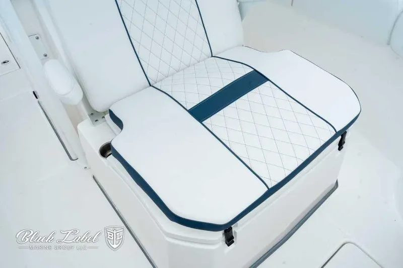 Slide: The Image of 2025 Sea Fox 288 Commander Center Console seat with diamond-patterned upholstery. - 8
