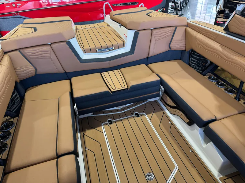 Slide: The Image of Interior of 2025 Nautique Super Air Nautique G23 with luxurious seating. - 14