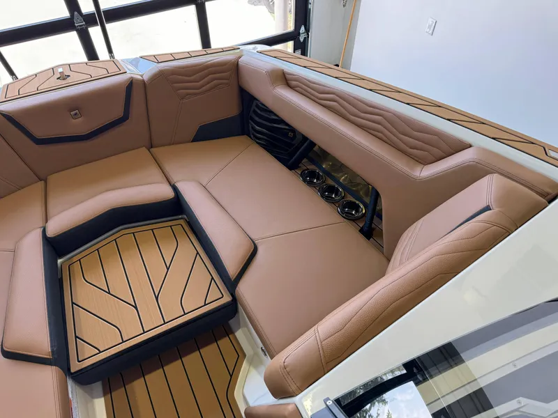 Slide: The Image of Luxurious interior of 2025 Nautique Super Air Nautique G23 boat. - 16