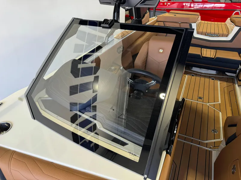 Slide: The Image of 2025 Nautique Super Air Nautique G23 interior view. - 18