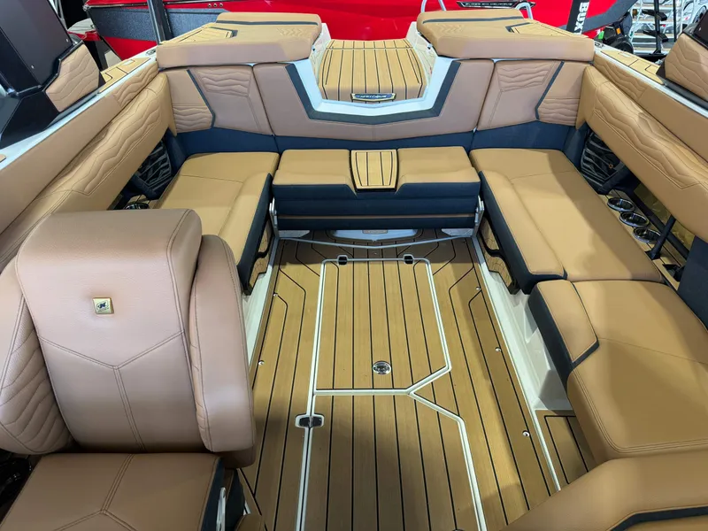 Slide: The Image of 2025 Nautique Super Air Nautique G23 interior with luxurious seating. - 20