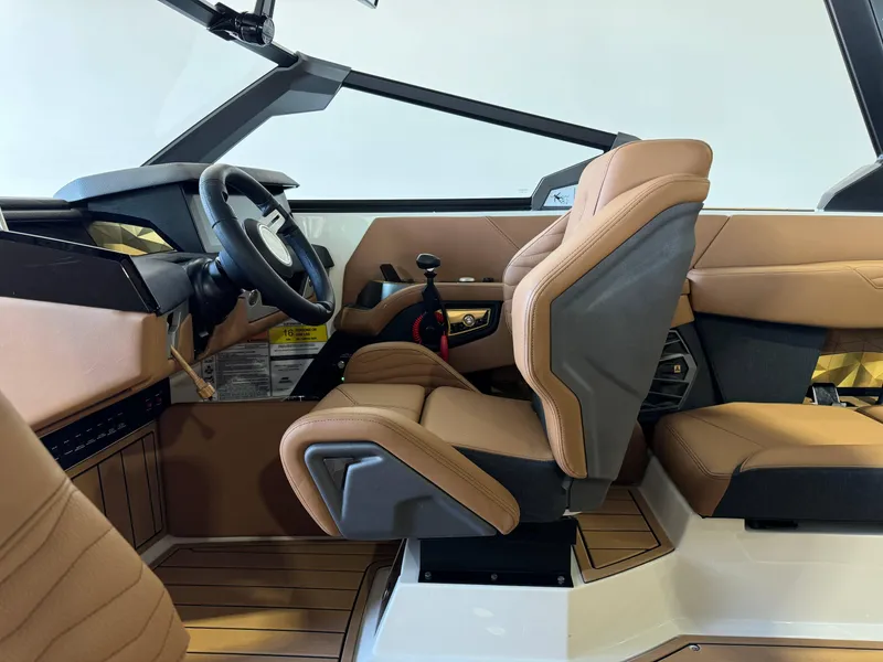 Slide: The Image of 2025 Nautique Super Air Nautique G23 interior cockpit view. - 21