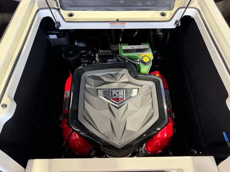 Slide: The Image of Engine compartment of 2025 Nautique Super Air Nautique G23 boat. - 26