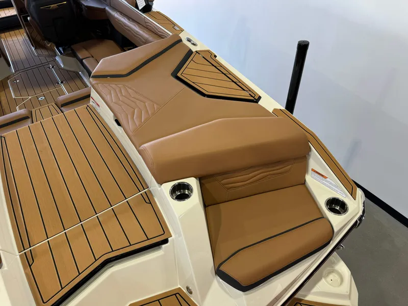 Slide: The Image of 2025 Nautique Super Air G23 with luxurious brown interior. - 9
