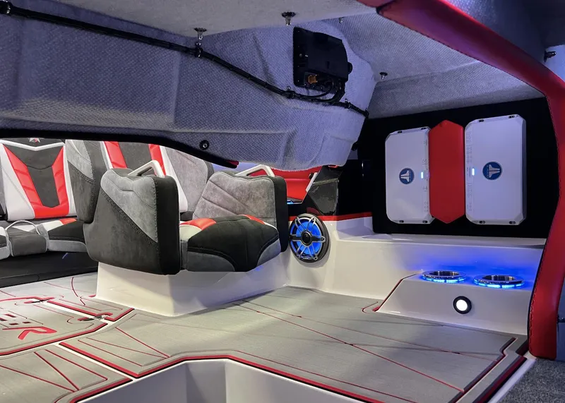 Slide: The Image of Interior of 2023 Daves Custom Boats M28R with modern seating and audio system. - 11