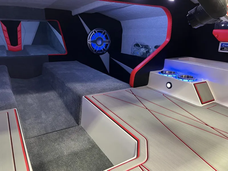 Slide: The Image of 2023 Daves Custom Boats M28R interior with modern design and blue LED lighting. - 9