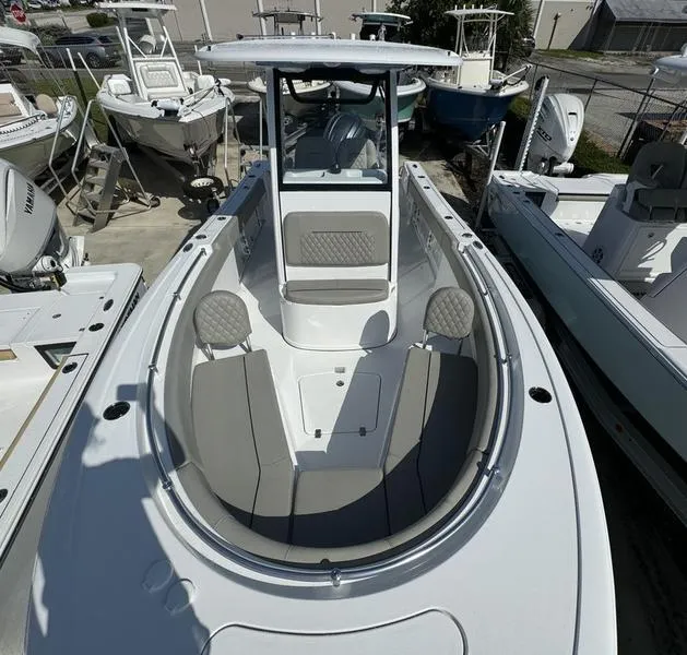 Slide: The Image of 2025 Sportsman Open 232 boat with spacious seating and modern design. - 10