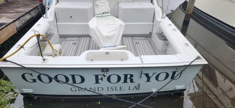 Slide: The Image of 1995 Cabo 35 Express boat named "Good For You" docked at Grand Isle, LA. - 3