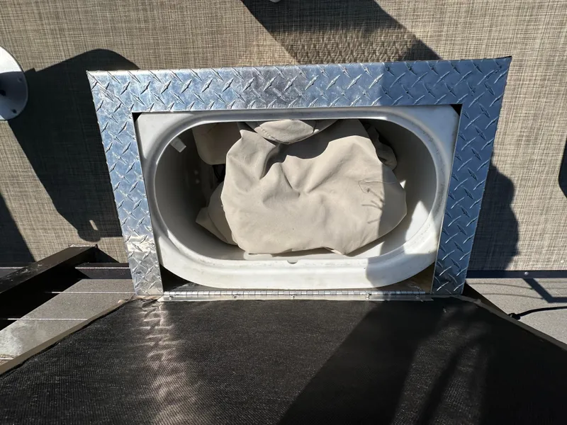 Slide: The Image of Built-in storage compartment on Lake Lounger 13FISH4E boat, 2021 model. - 9