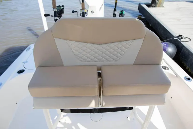 Slide: The Image of 2026 Scout 231 XSB boat seat with beige and white quilted design. - 10