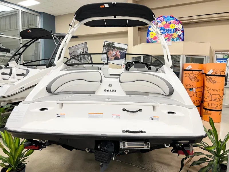 Slide: The Image of 2025 Yamaha Boats AR190 displayed indoors, rear view with sleek design and modern features. - 3