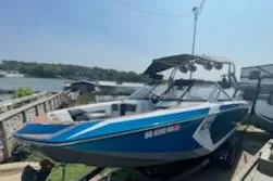 Slide: The Image of 2017 Nautique Super Air Nautique G23 interior with sleek design and modern dashboard. - 8