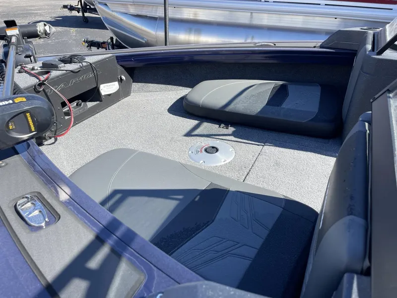 Slide: The Image of 2025 Tracker Targa V-19 Combo boat interior with seating and equipment. - 8