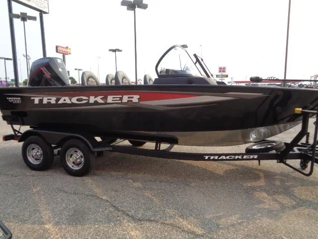 Slide: The Image of 2025 Tracker Targa V-19 WT boat on trailer in parking lot. - 3