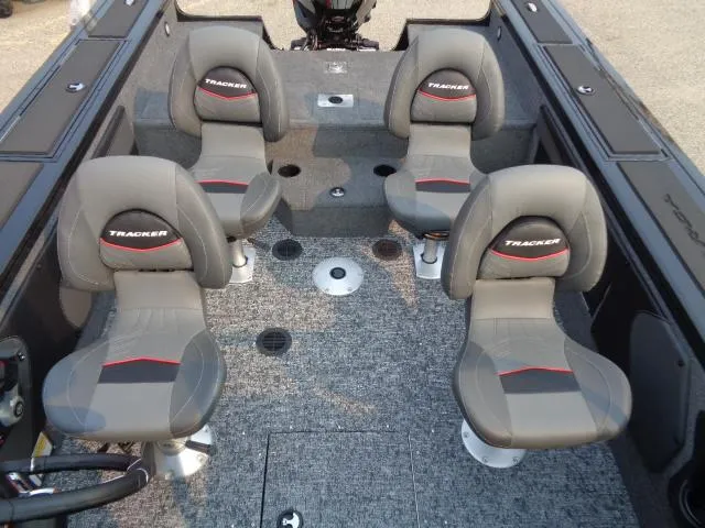Slide: The Image of 2025 Tracker Targa V-19 WT boat interior with four gray seats. - 7