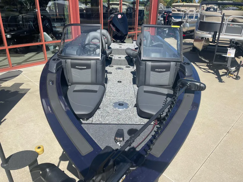 Slide: The Image of 2025 Tracker Targa V-19 Combo boat with dual seating and modern design. - 2