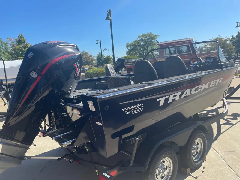 Slide: The Image of 2025 Tracker Targa V-19 Combo boat on trailer, outdoor setting. - 4