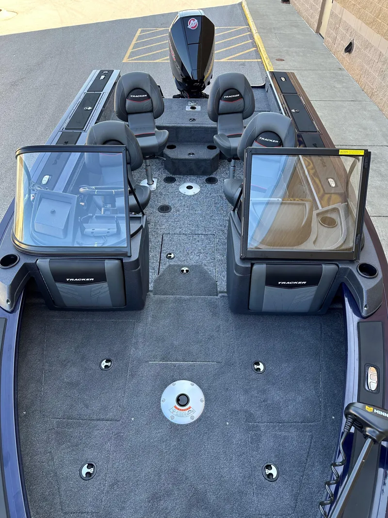 Slide: The Image of 2025 Tracker Targa V-19 Combo boat interior with seating and windshield. - 5