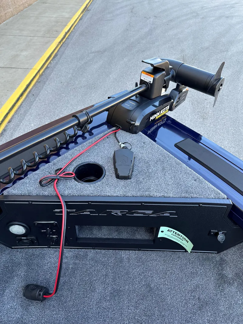 Slide: The Image of 2025 Tracker Targa V-19 Combo boat with trolling motor and control panel. - 8