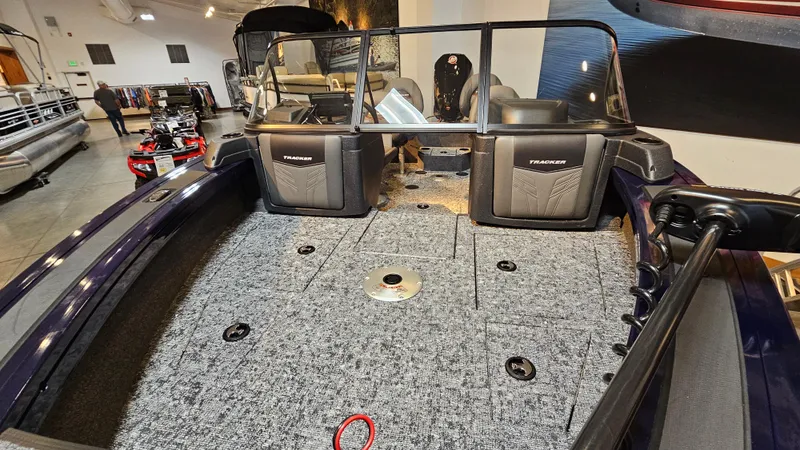 Slide: The Image of 2025 Tracker Targa V-19 WT boat interior with spacious deck and seating. - 2