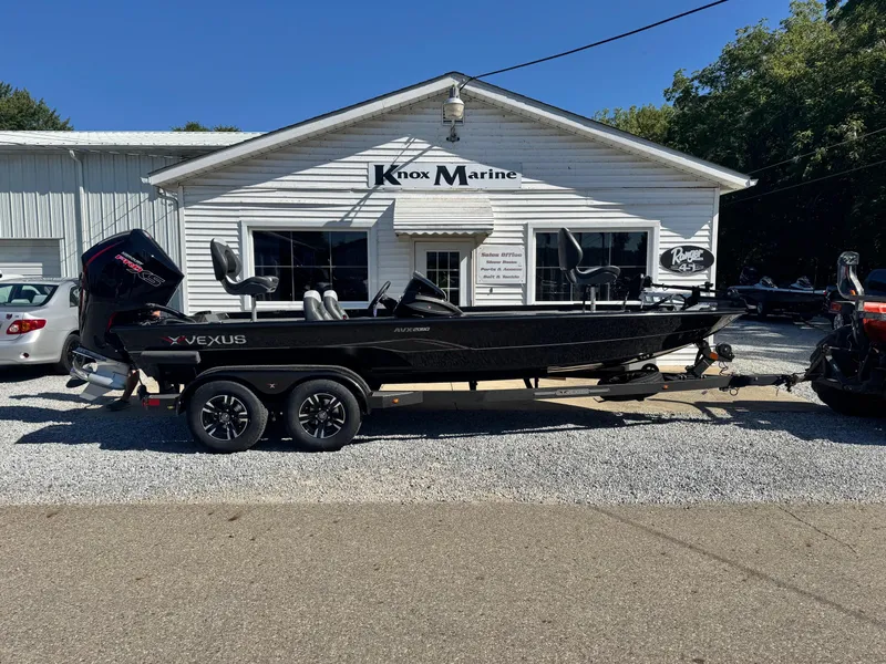 Slide: The Image of 2025 Vexus AVX2080 boat parked outside Knox Marine dealership. - 1
