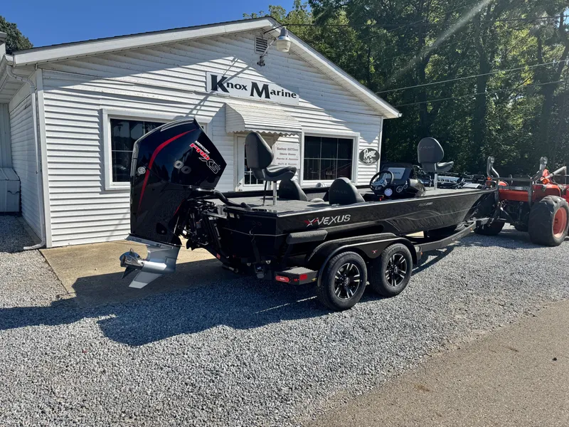 Slide: The Image of 2025 Vexus AVX2080 boat on trailer outside Knox Marine dealership. - 3