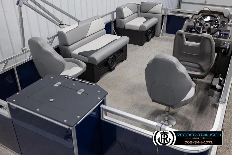 Slide: The Image of Interior of 2025 Avalon VEN RF pontoon boat with seating and steering console. - 12