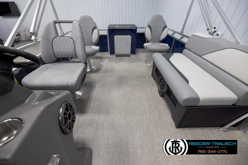 Slide: The Image of 2025 Avalon VEN RF boat interior with gray seating and modern design. - 14
