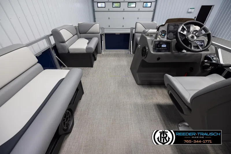 Slide: The Image of Avalon VEN RF 2025 boat interior with modern seating and steering console. - 17