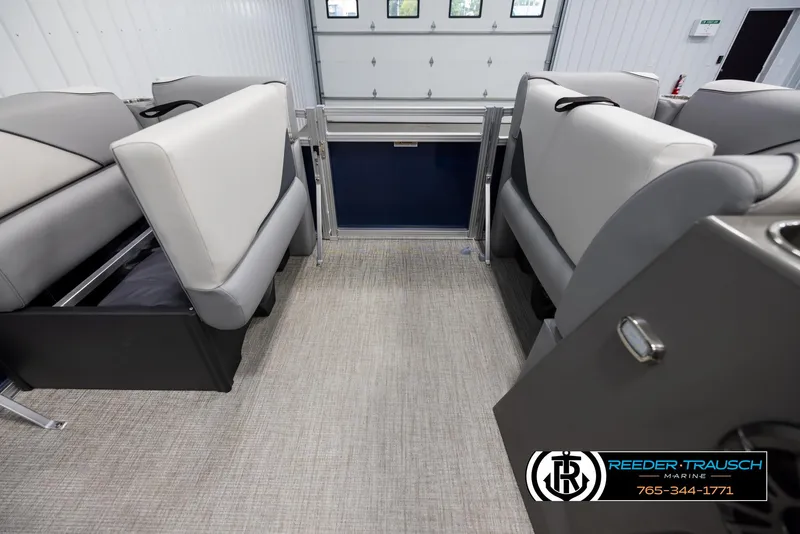 Slide: The Image of 2025 Avalon VEN RF interior with gray seating and carpeted flooring. - 19