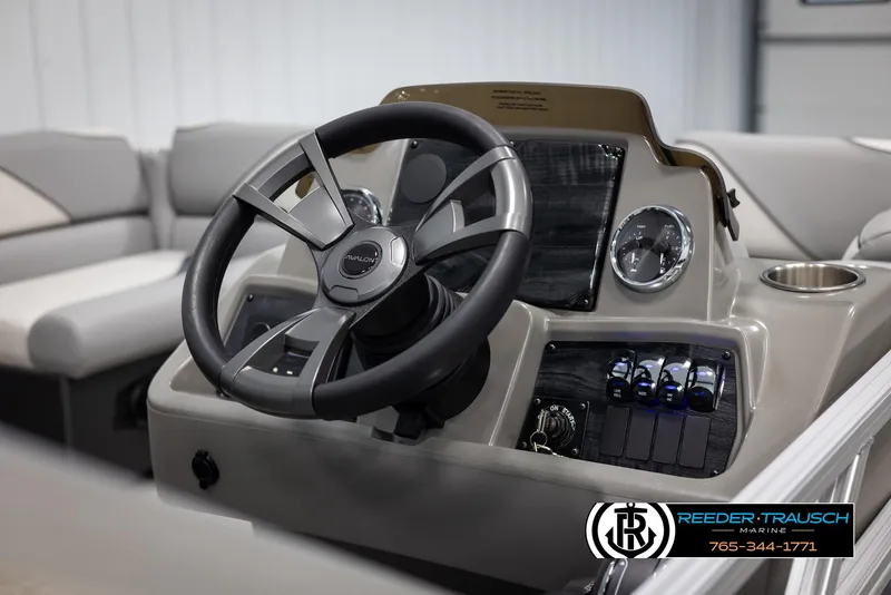 Slide: The Image of Steering console of 2025 Avalon VEN RF boat with modern controls and dashboard. - 24