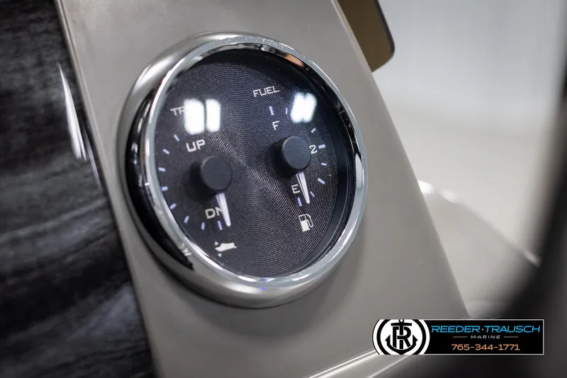 Slide: The Image of Close-up of 2025 Avalon VEN RF dashboard gauge with fuel and trim indicators. - 29