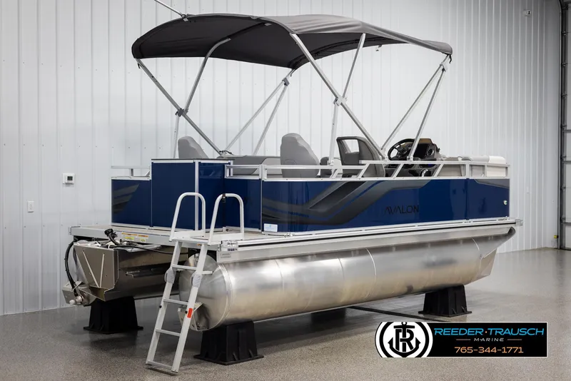 Slide: The Image of 2025 Avalon VEN RF pontoon boat with canopy in showroom. - 6