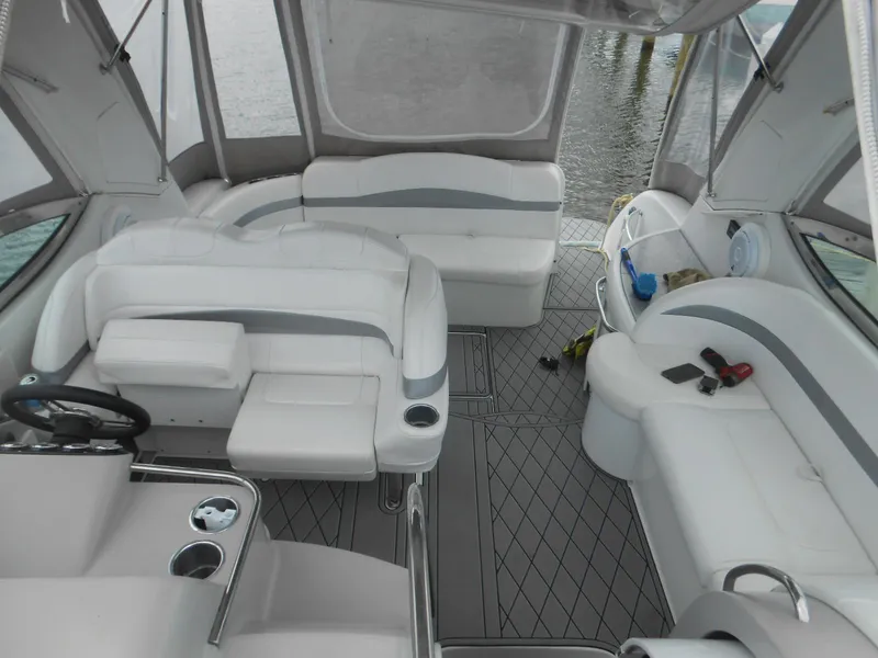 Slide: The Image of 2004 Formula 37 PC yacht interior with white seating and modern design. - 13