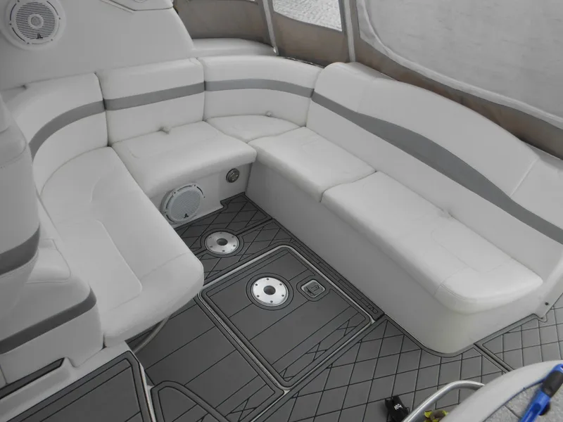 Slide: The Image of Luxurious 2004 Formula 37 PC yacht interior with white seating and modern flooring. - 14