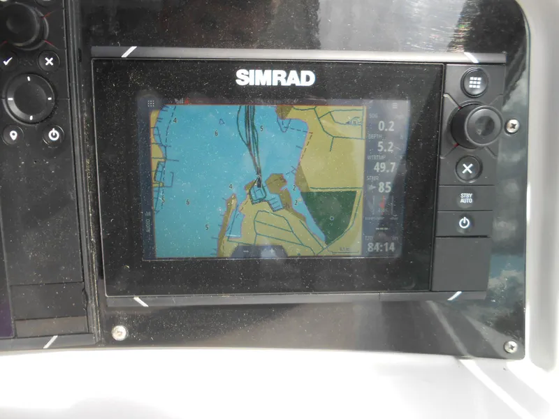 Slide: The Image of Simrad navigation system on 2004 Formula 37 PC boat displaying nautical chart. - 21