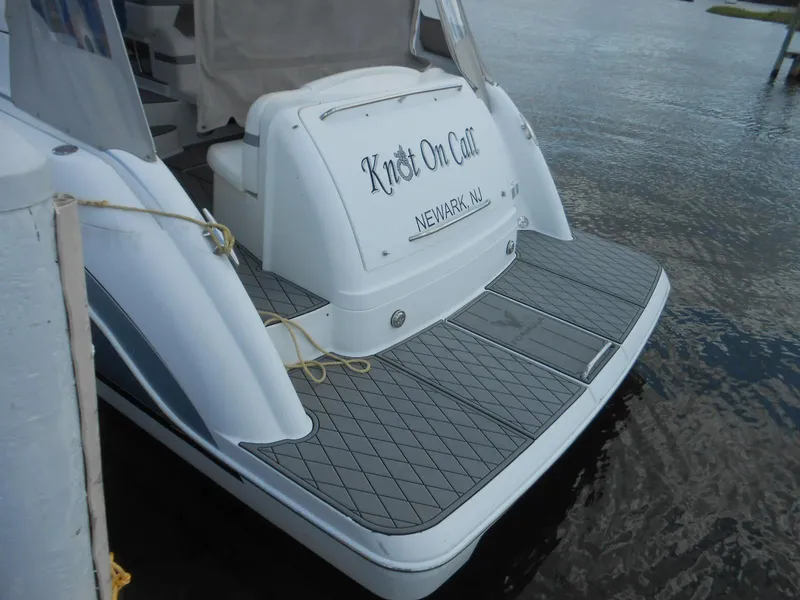 Slide: The Image of 2004 Formula 37 PC boat docked, featuring "Knot On Call" nameplate, Newark, NJ. - 22