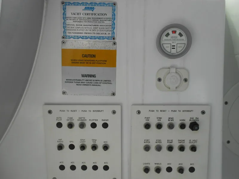 Slide: The Image of Control panel of a 2004 Formula 37 PC yacht with certification and warning labels. - 9