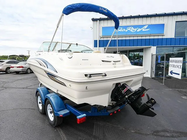 Slide: The Image of 2001 Sea Ray 190 Sundeck boat on trailer outside showroom. - 3